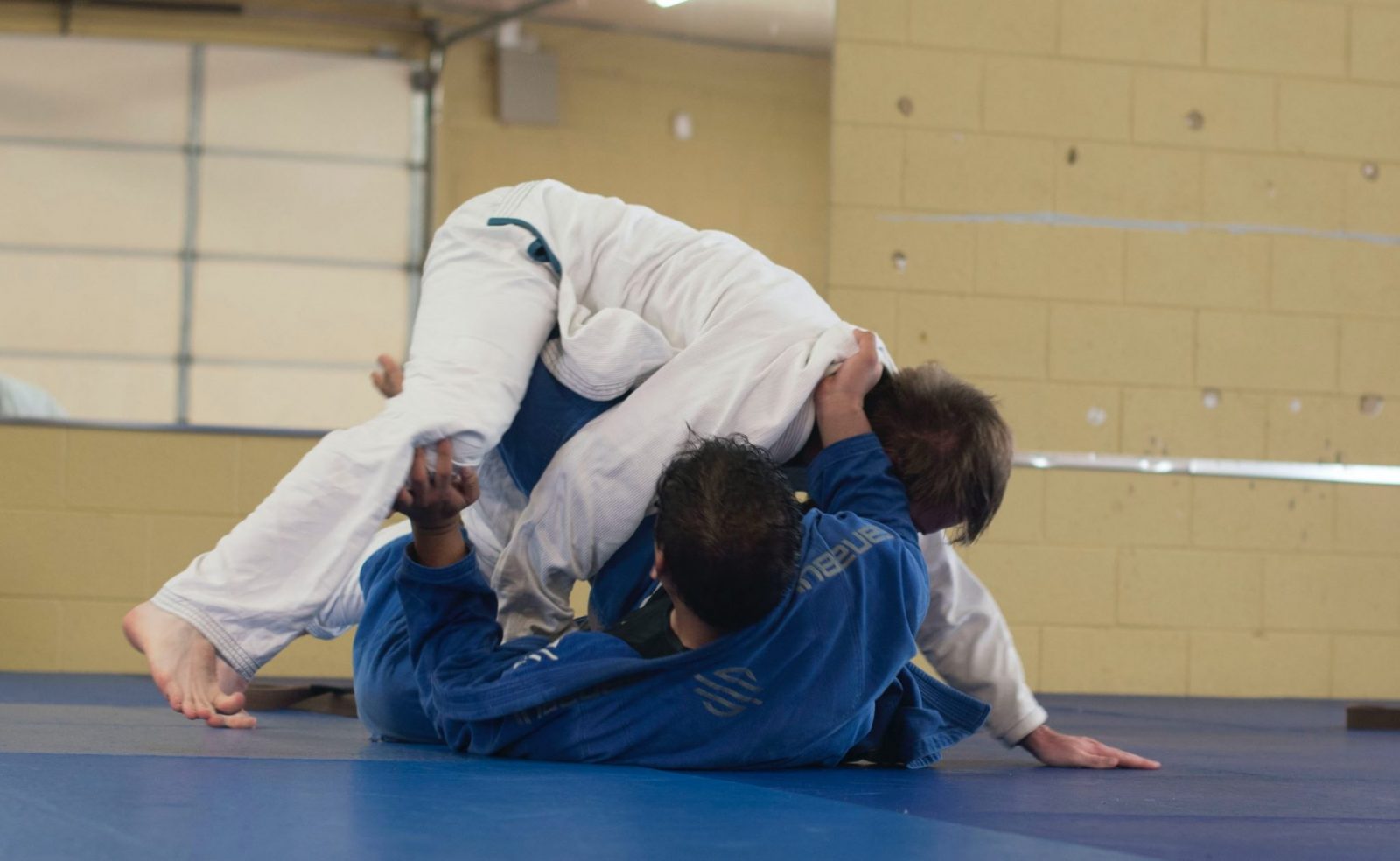 photo of two man wearing Taekwondo suit